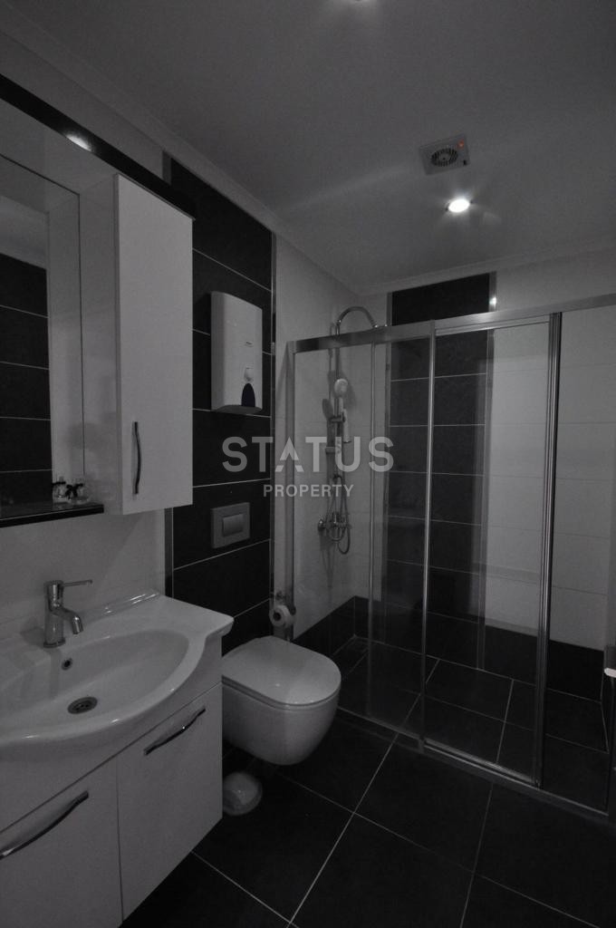 Просторная квартира 1+1 с мебелью и техникой у моря в районе Кестель, 70 м2. фото 18