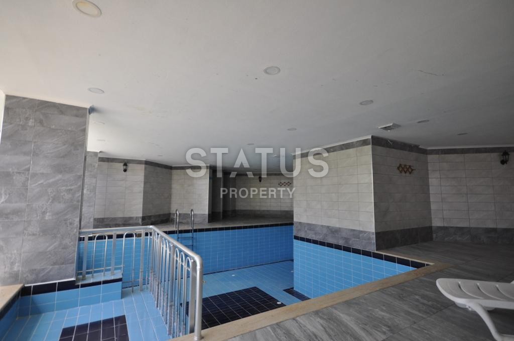 Просторная квартира 1+1 с мебелью и техникой у моря в районе Кестель, 70 м2. фото 19