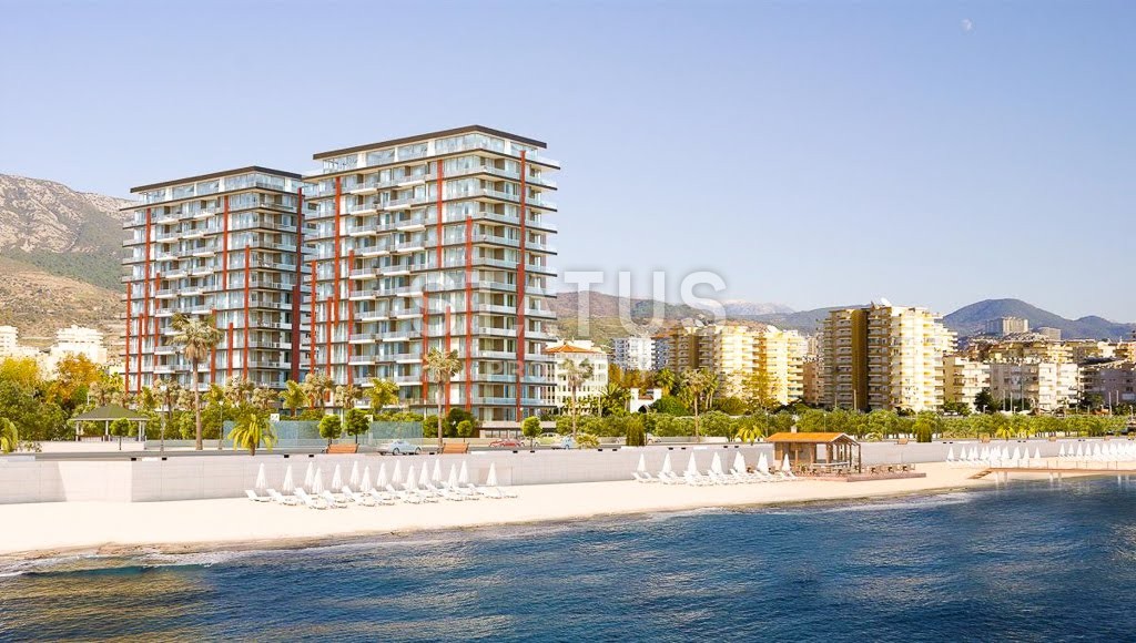 Апартаменты 1+1 в новом элитном комплексе на первой линии в Махмутларе, 55 м2. фото 7