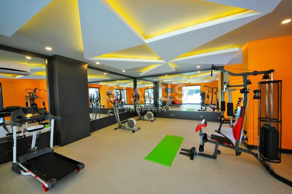 Апартаменты 1+1 в новом элитном комплексе на первой линии в Махмутларе, 55 м2. фото 20