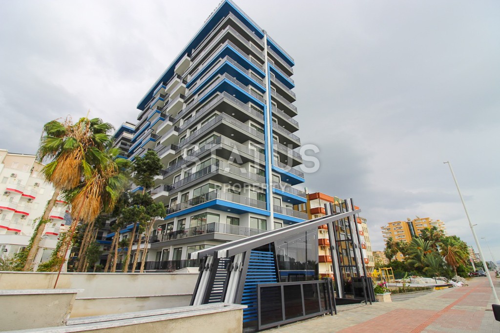 Апартаменты 1+1 в новом элитном комплексе на первой линии в Махмутларе, 55 м2. фото 23