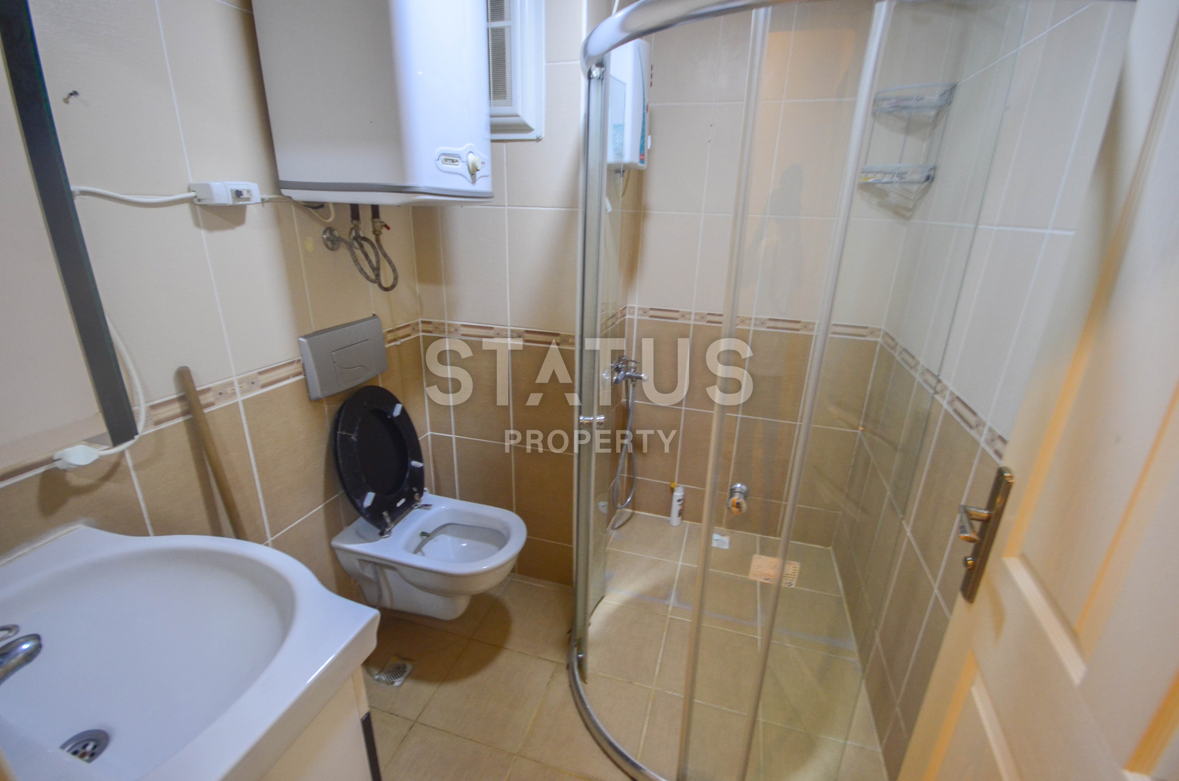 Квартира 2+1 с видом на горы в нескольких шагах от моря в районе Махмутлар, 115 м2. фото 11