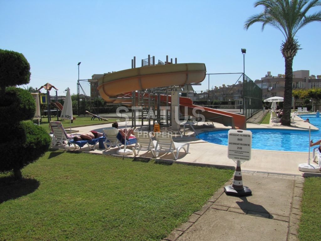 Апартаменты 1+1, 70 кв.м. в комплексе с большой территорией и низкоэтажной постройкой. Джикджилли, Алания. фото 9