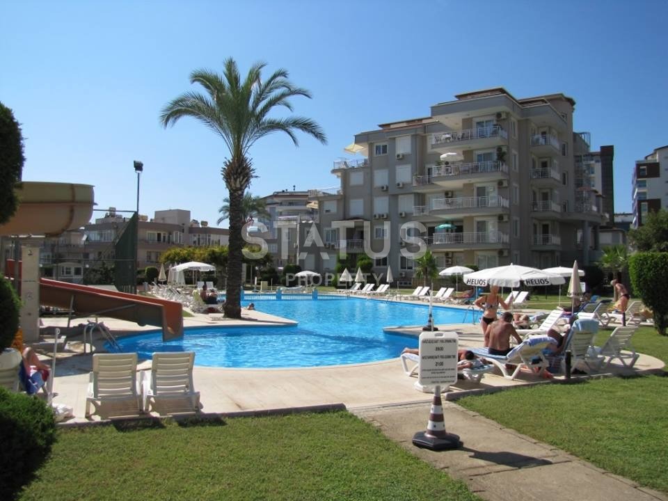 Апартаменты 1+1, 70 кв.м. в комплексе с большой территорией и низкоэтажной постройкой. Джикджилли, Алания. фото 11