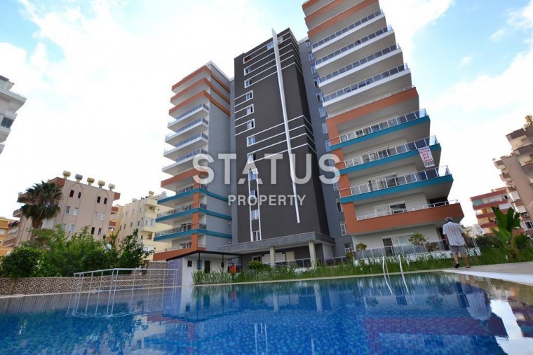 Просторная двухкомнатная квартира без мебели в комплексе с развитой инфраструктурой, 77м2 фото 1