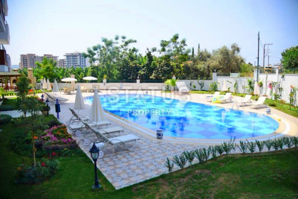 Furnished apartment 1+1 overlooking the sea and the historic city of Naula, 75 m2. Mahmutlar, Alanya. фото 3