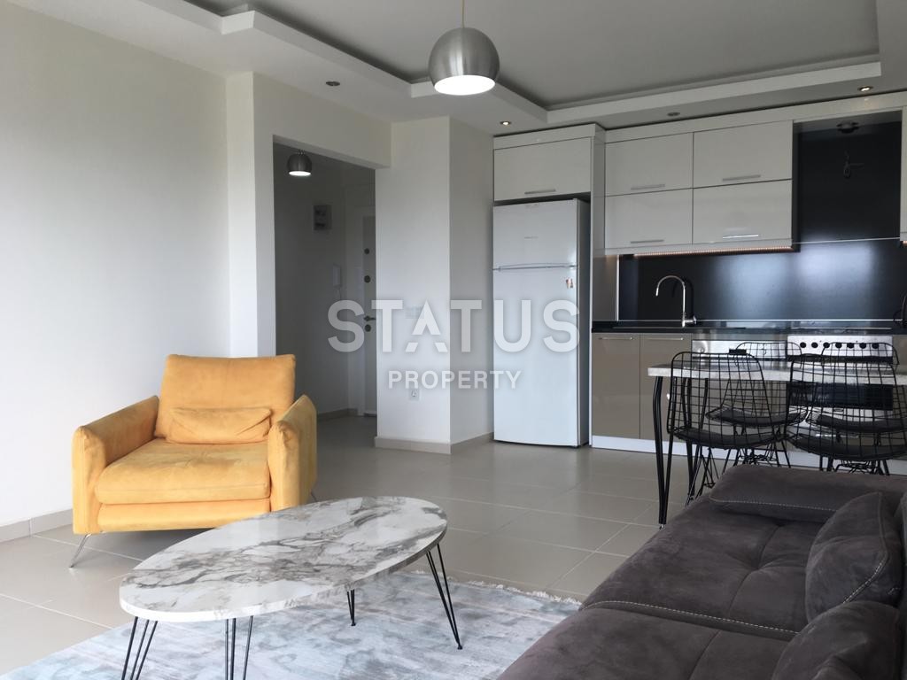 Furnished apartment 1+1 overlooking the sea and the historic city of Naula, 75 m2. Mahmutlar, Alanya. фото 14