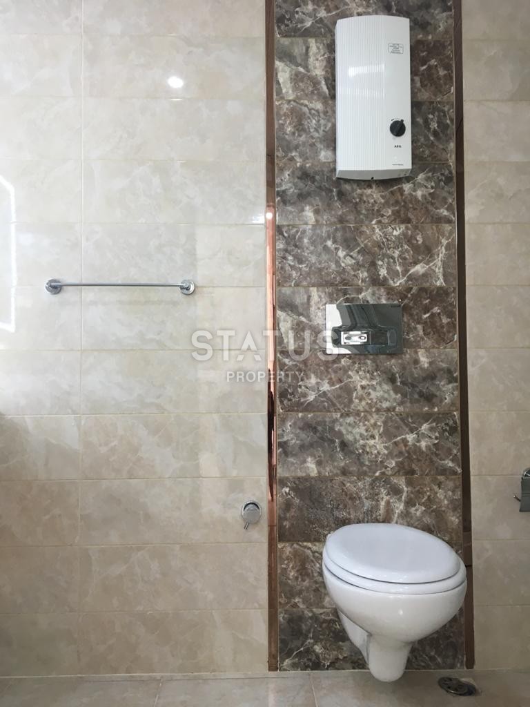 Furnished apartment 1+1 overlooking the sea and the historic city of Naula, 75 m2. Mahmutlar, Alanya. фото 20