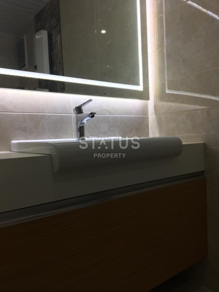 Furnished apartment 1+1 overlooking the sea and the historic city of Naula, 75 m2. Mahmutlar, Alanya. фото 22