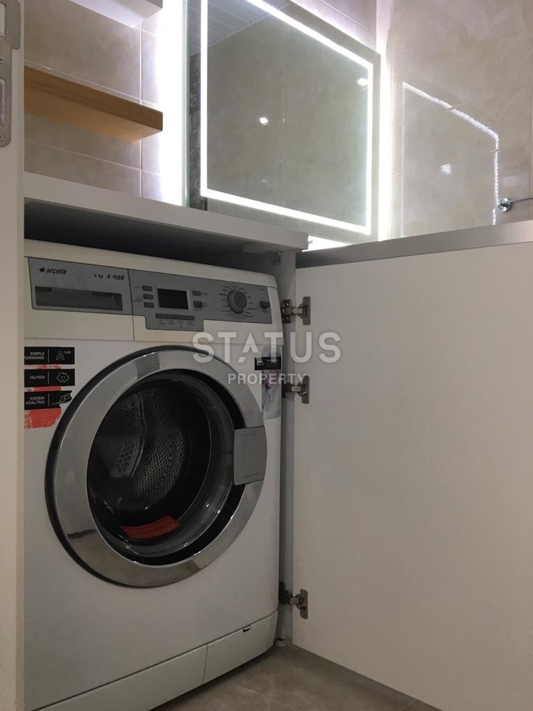 Furnished apartment 1+1 overlooking the sea and the historic city of Naula, 75 m2. Mahmutlar, Alanya. фото 24