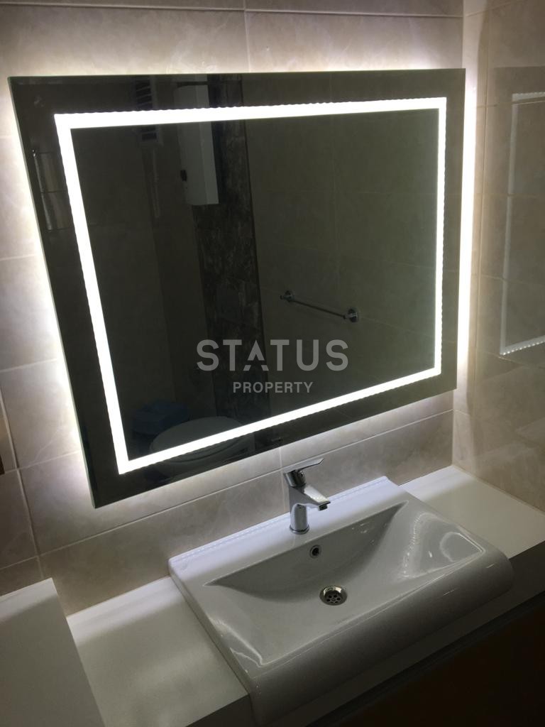 Furnished apartment 1+1 overlooking the sea and the historic city of Naula, 75 m2. Mahmutlar, Alanya. фото 27