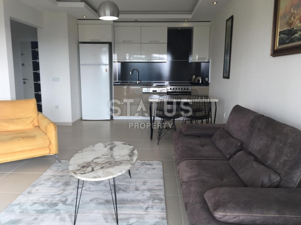 Furnished apartment 1+1 overlooking the sea and the historic city of Naula, 75 m2. Mahmutlar, Alanya. фото 30