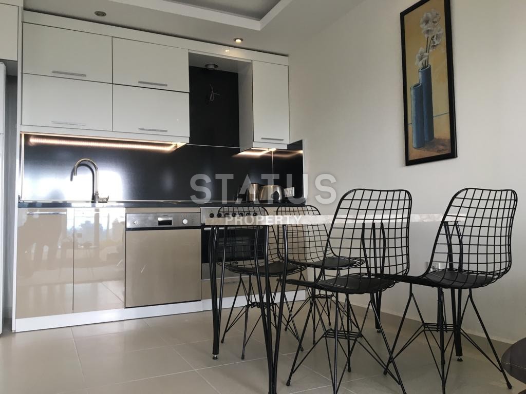 Furnished apartment 1+1 overlooking the sea and the historic city of Naula, 75 m2. Mahmutlar, Alanya. фото 31