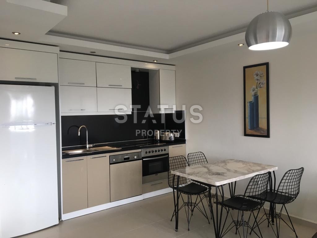 Furnished apartment 1+1 overlooking the sea and the historic city of Naula, 75 m2. Mahmutlar, Alanya. фото 33