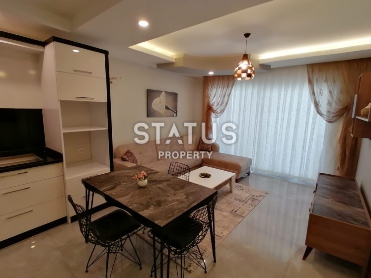 В новом комплексе с бассейном квартира 1+1, 55 м2. Махмутлар, Алания. фото 1