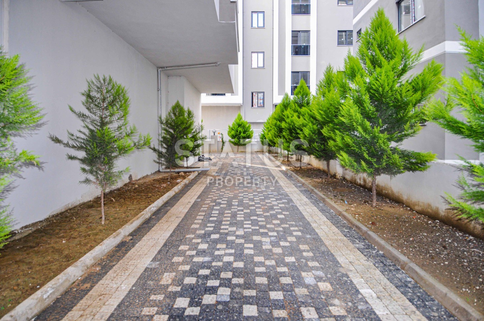 Двухкомнатная квартира 48 кв.м., укомплектованная мебелью в новом доме. Махмутлар, Алания. фото 16