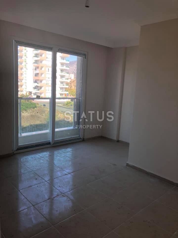 Недорогая квартира в Махмутларе возле моря 55 кв.м. фото 5