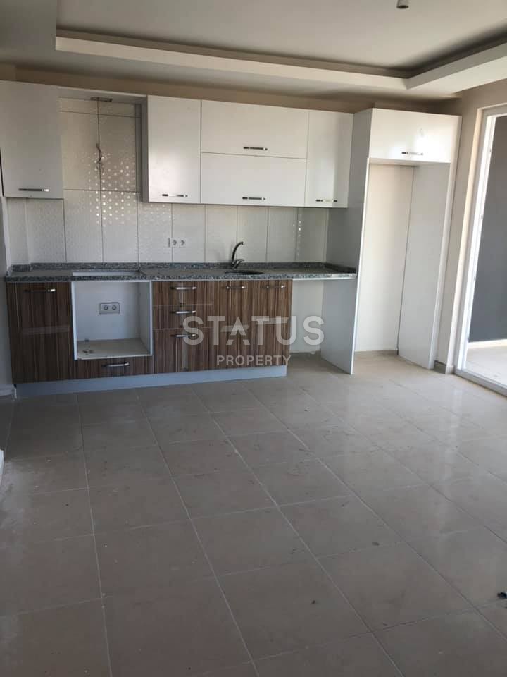 Недорогая квартира в Махмутларе возле моря 55 кв.м. фото 7