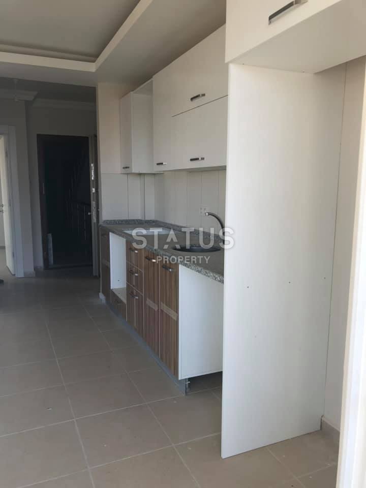 Недорогая квартира в Махмутларе возле моря 55 кв.м. фото 10