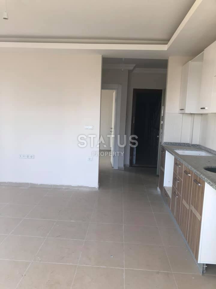 Недорогая квартира в Махмутларе возле моря 55 кв.м. фото 15