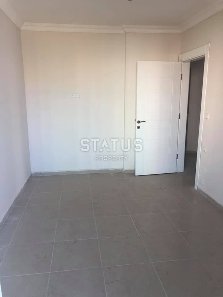 Недорогая квартира в Махмутларе возле моря 55 кв.м. фото 16