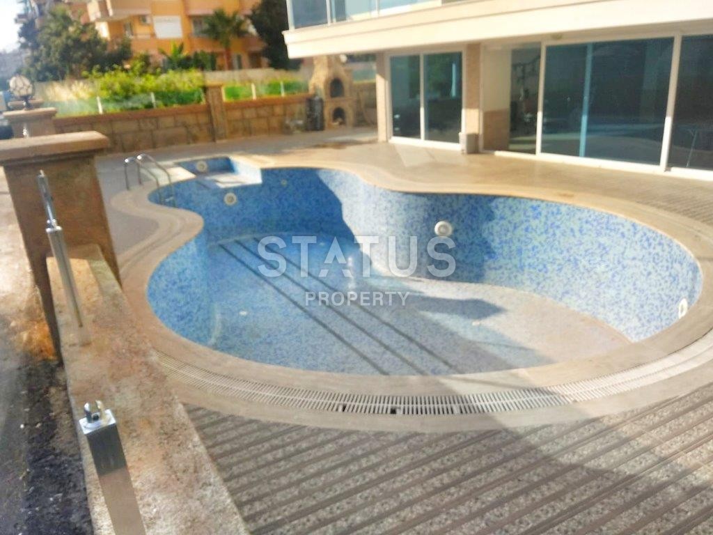 Furnished apartment 1+1, 65 m2, five minutes walk from the sea in Mahmutlar. фото 5