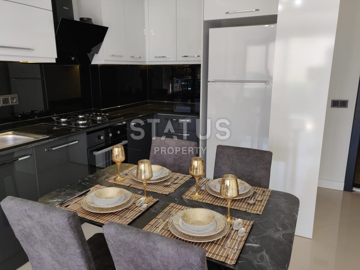 Квартира 1+1 в новом доме с лучшей локацией в районе Оба в 200 метрах от моря! 55 кв.м. фото 3