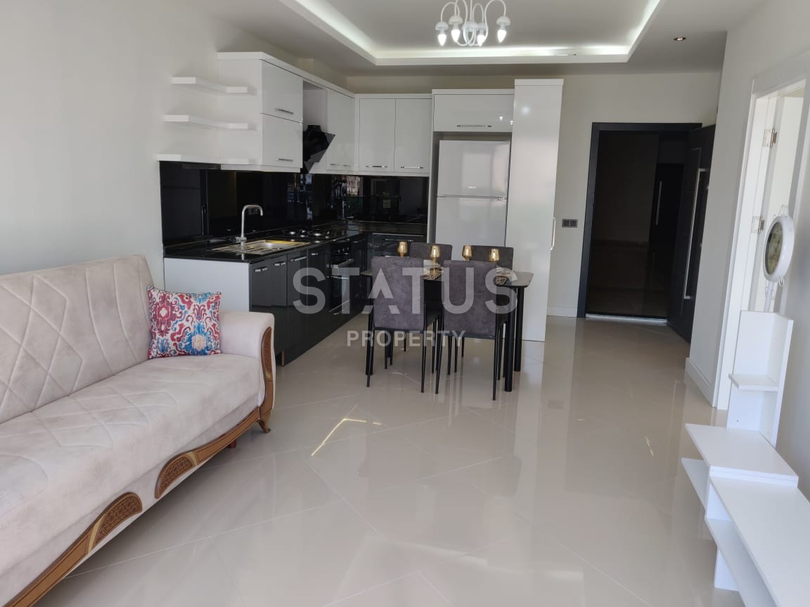 Квартира 1+1 в новом доме с лучшей локацией в районе Оба в 200 метрах от моря! 55 кв.м. фото 21