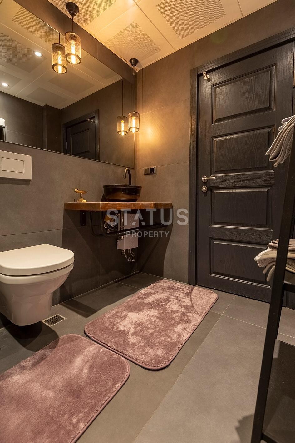 Дизайнерская квартира 1+1 с камином, 55 м2 в центре Алании. фото 10