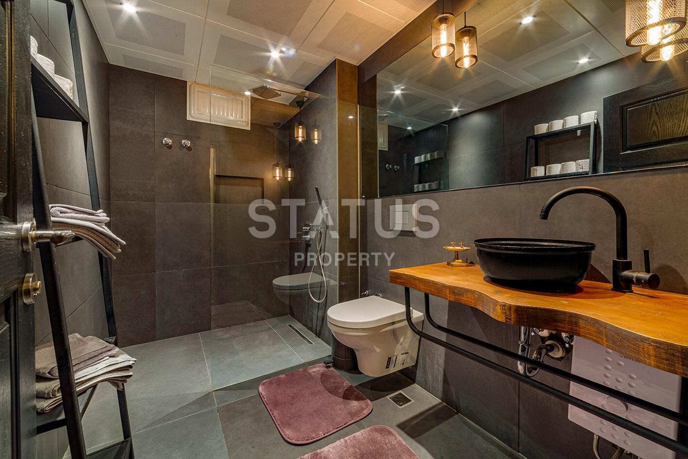 Дизайнерская квартира 1+1 с камином, 55 м2 в центре Алании. фото 12