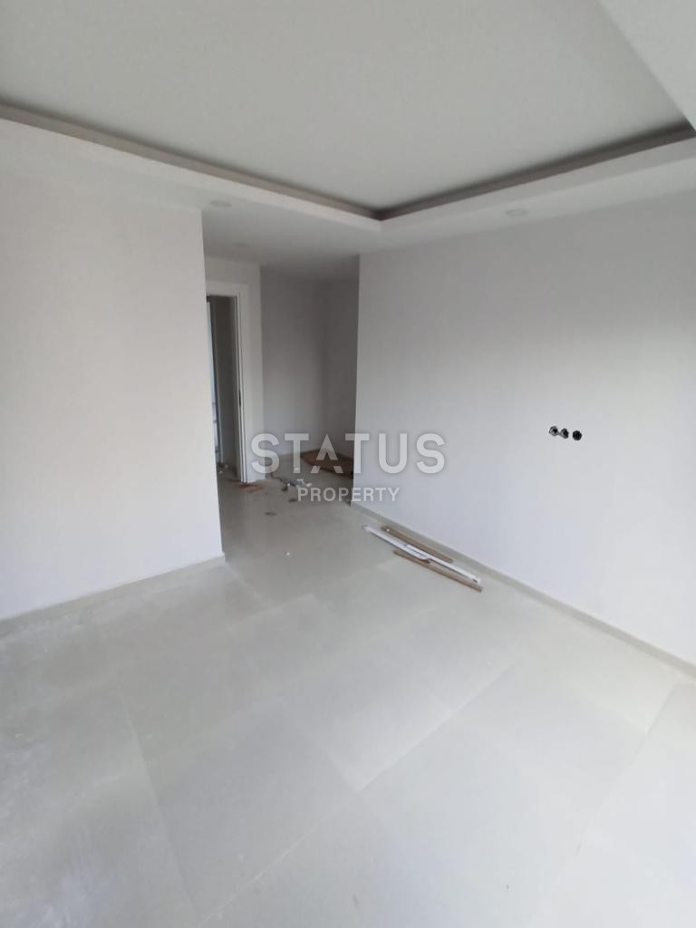 Двухуровневые апартаменты 2+1, 110 м2 в новом комплексе в Махмутларе. фото 16