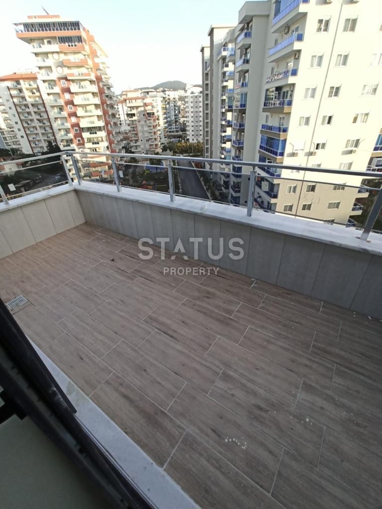 Двухуровневые апартаменты 2+1, 110 м2 в новом комплексе в Махмутларе. фото 24