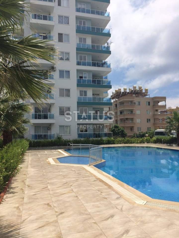 Квартира 1+1 с мебелью и техникой, 55 м2 в Махмутларе. фото 1