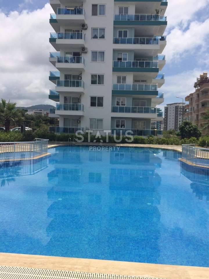 Квартира 1+1 с мебелью и техникой, 55 м2 в Махмутларе. фото 2