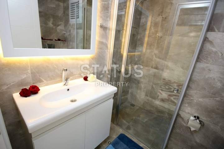 Apartment 1+1 with furniture and appliances, 55 m2 in Mahmutlar. фото 3