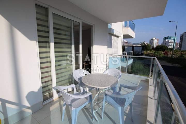 Apartment 1+1 with furniture and appliances, 55 m2 in Mahmutlar. фото 4