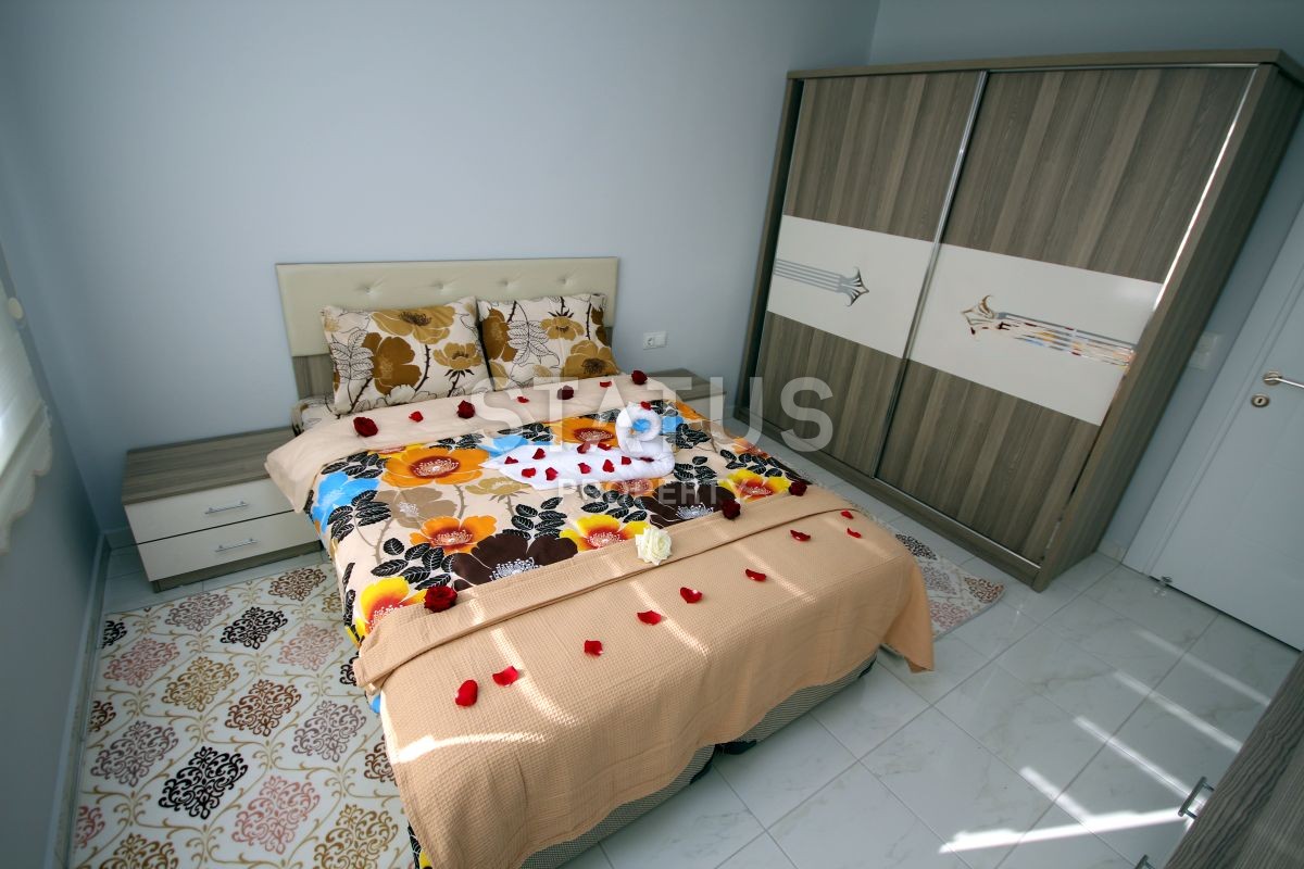 Apartment 1+1 with furniture and appliances, 55 m2 in Mahmutlar. фото 5