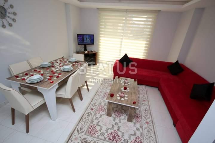 Apartment 1+1 with furniture and appliances, 55 m2 in Mahmutlar. фото 6