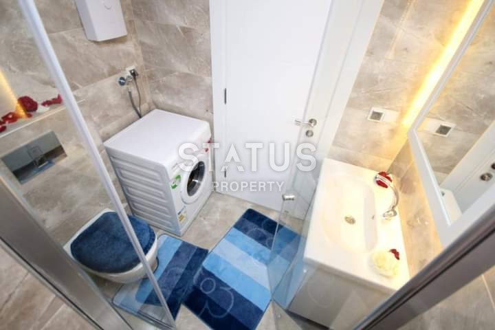 Apartment 1+1 with furniture and appliances, 55 m2 in Mahmutlar. фото 7