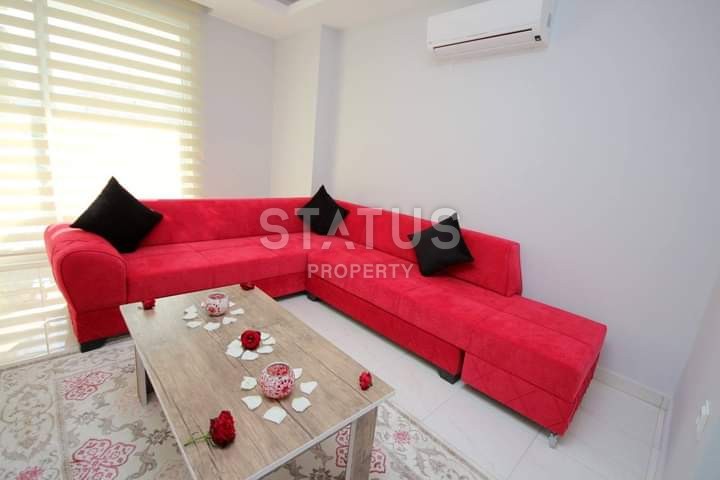 Apartment 1+1 with furniture and appliances, 55 m2 in Mahmutlar. фото 10