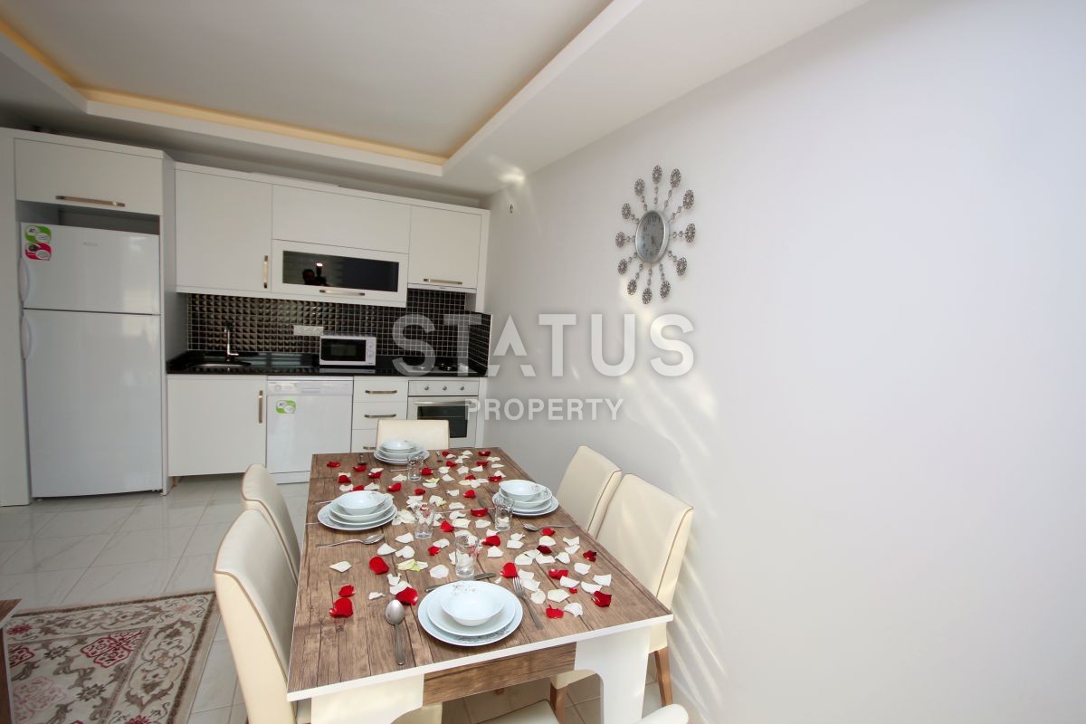 Apartment 1+1 with furniture and appliances, 55 m2 in Mahmutlar. фото 14