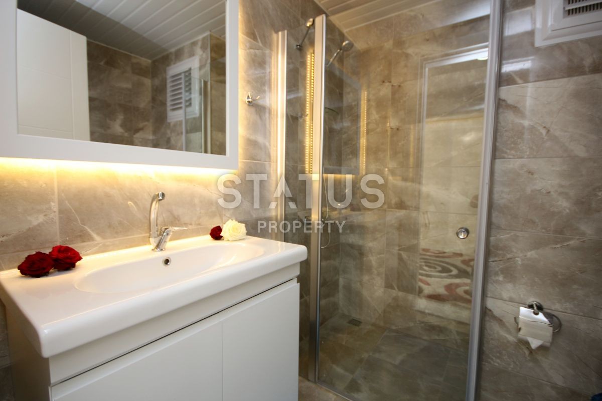 Apartment 1+1 with furniture and appliances, 55 m2 in Mahmutlar. фото 15