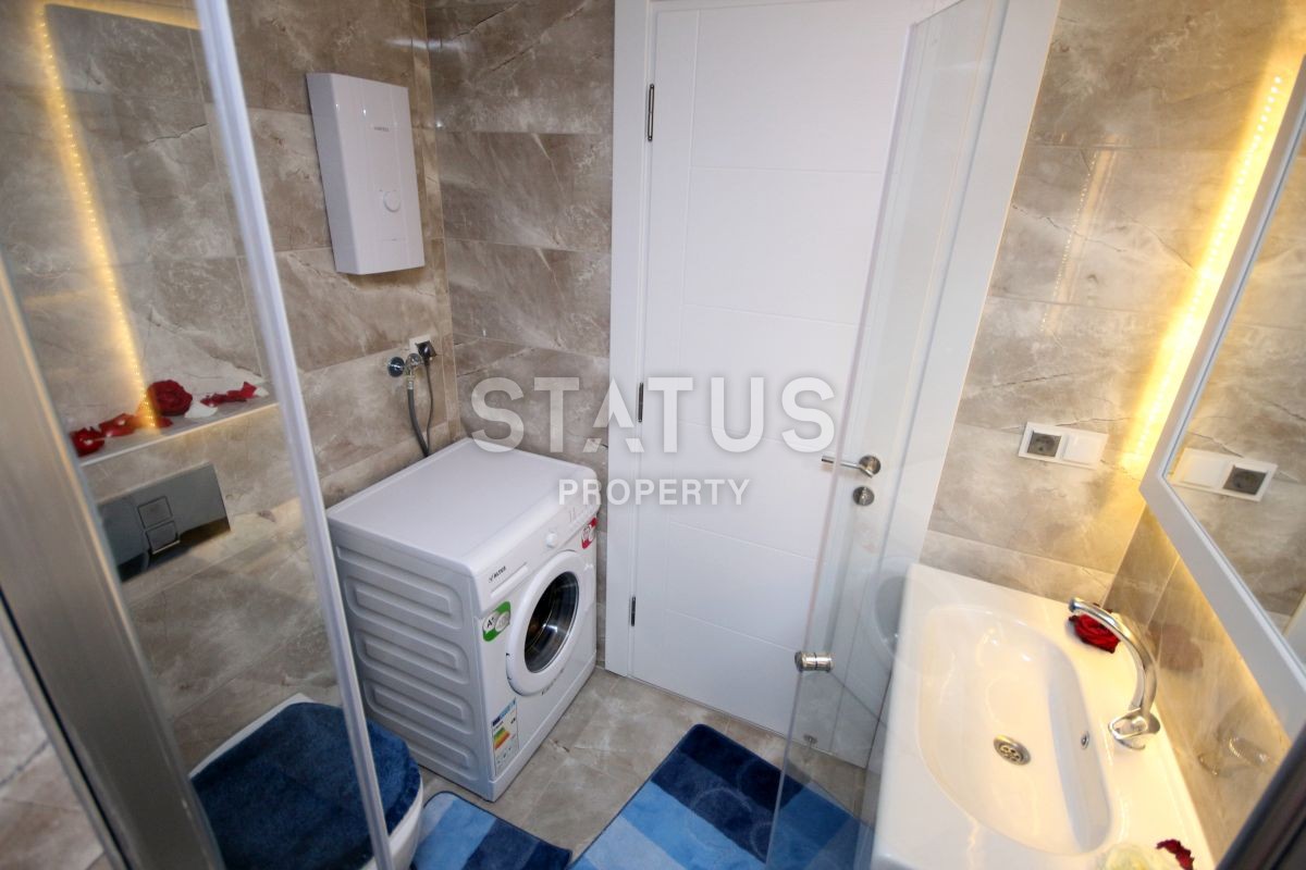 Apartment 1+1 with furniture and appliances, 55 m2 in Mahmutlar. фото 16