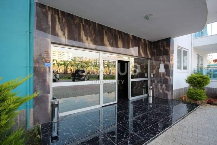 Apartment 1+1 with furniture and appliances, 55 m2 in Mahmutlar. фото 17