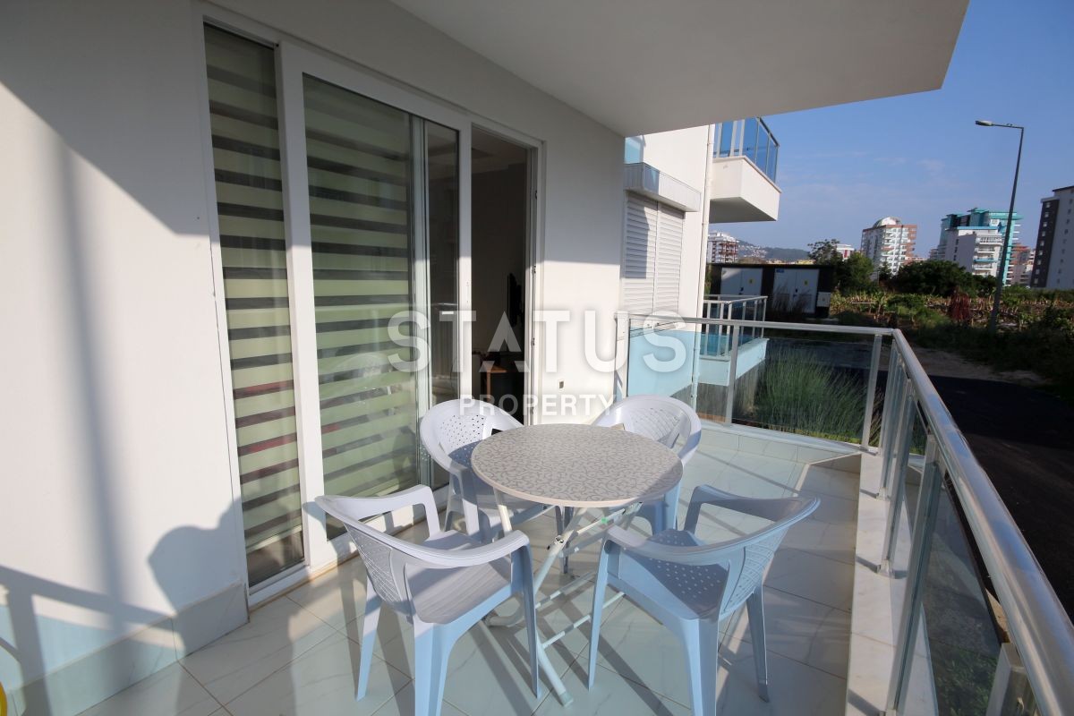 Apartment 1+1 with furniture and appliances, 55 m2 in Mahmutlar. фото 19