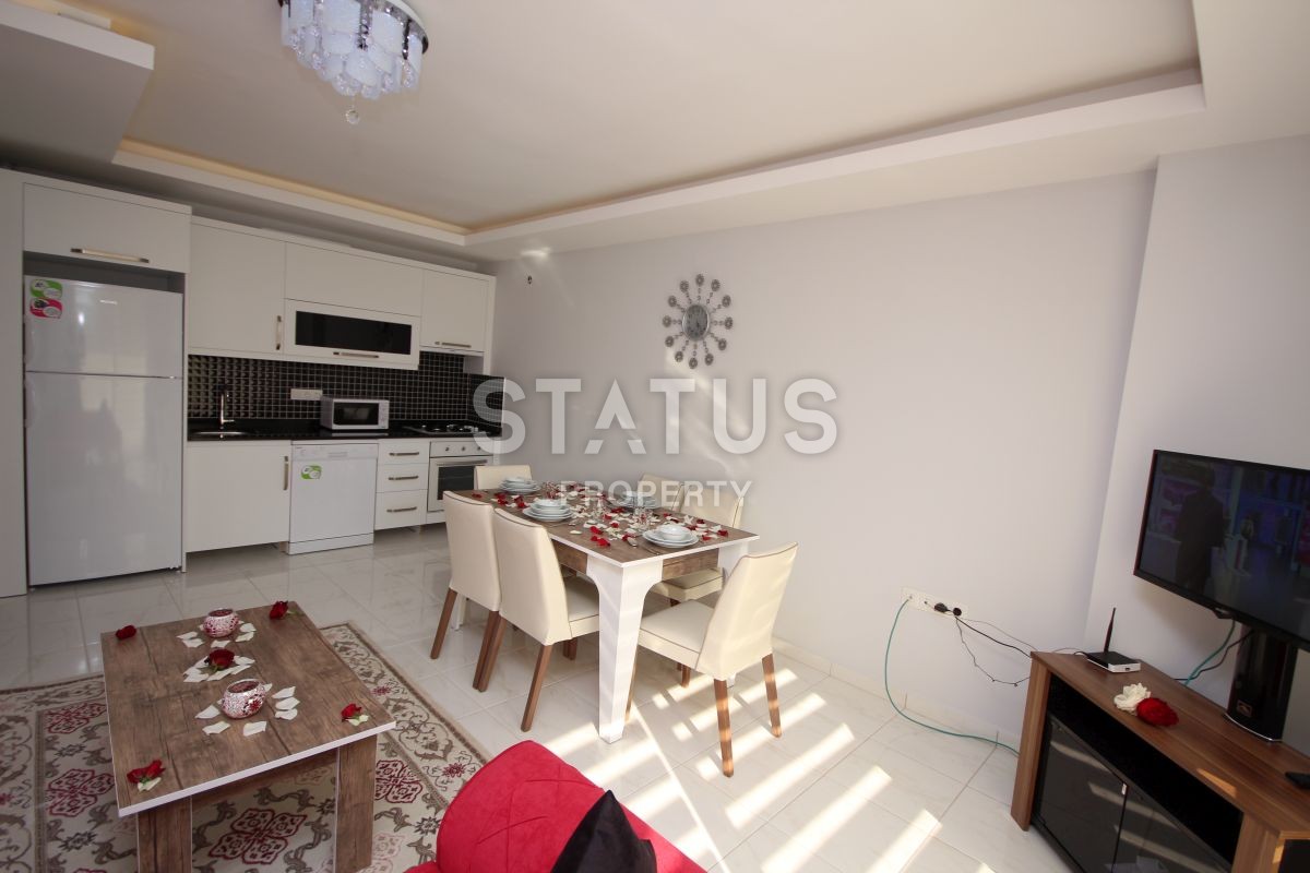 Apartment 1+1 with furniture and appliances, 55 m2 in Mahmutlar. фото 20