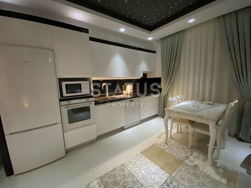 Меблированная квартира планировки 2+1, 105 м2 с видом на море в комплексе класса люкс, район Каргыджак, Аланья фото 11