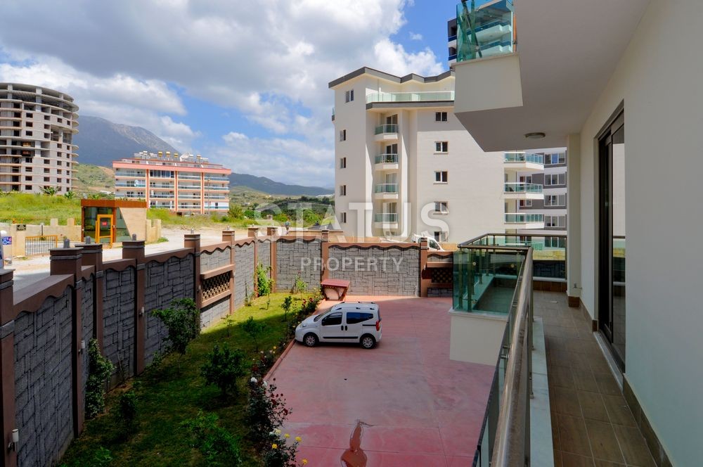 Меблированная большая двухкомнатная квартира в отличном районе Махмутлар, 90 кв.м. фото 8