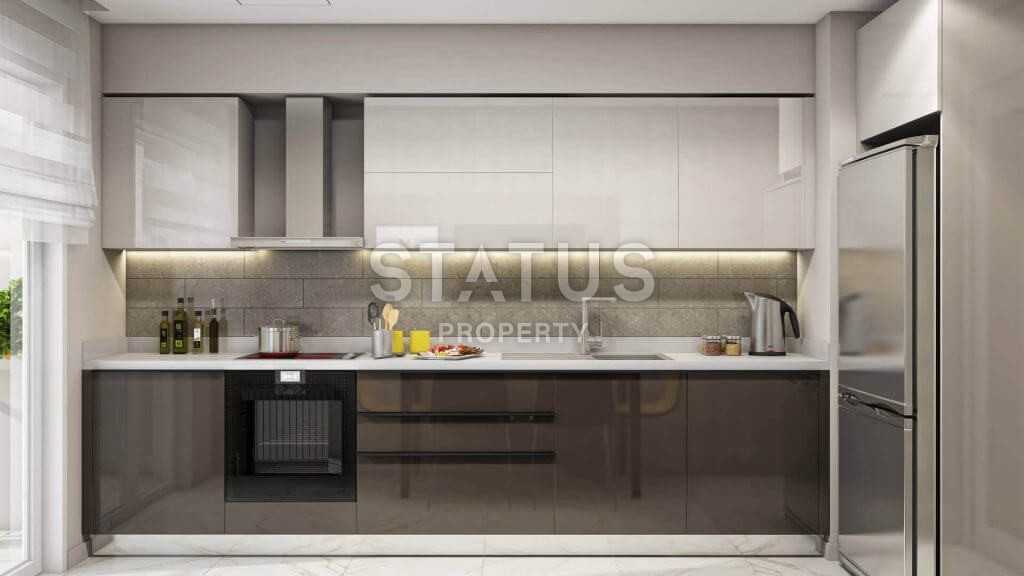 Новый инвестиционный комплекс с разными планировками апартаментов в популярном районе Бахчешехир, Стамбул. фото 10