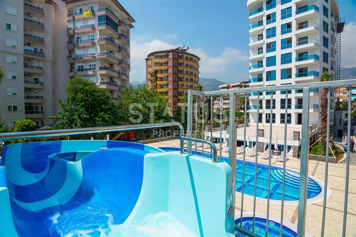 Новая четырехкомнатная квартира в элитном комплексе в центре Алании, 140 кв.м. фото 3